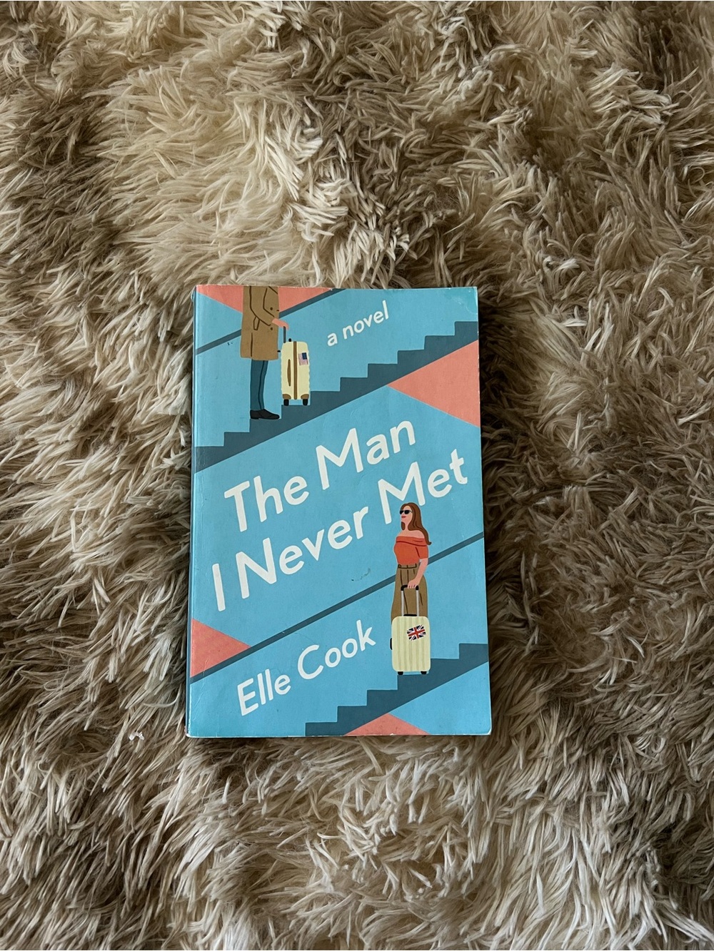 The Man I Never Met by Elle Cook - Blue & Coral Paperback